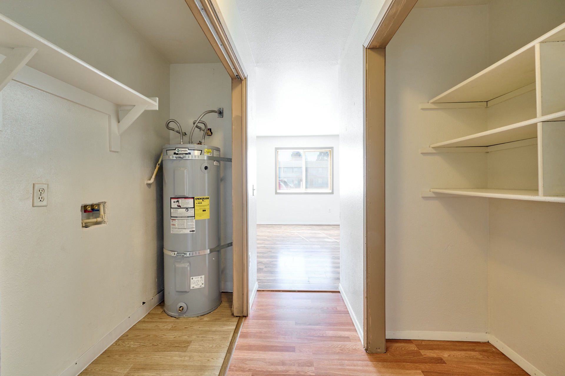 In-unit laundry hook-ups and water heater closet