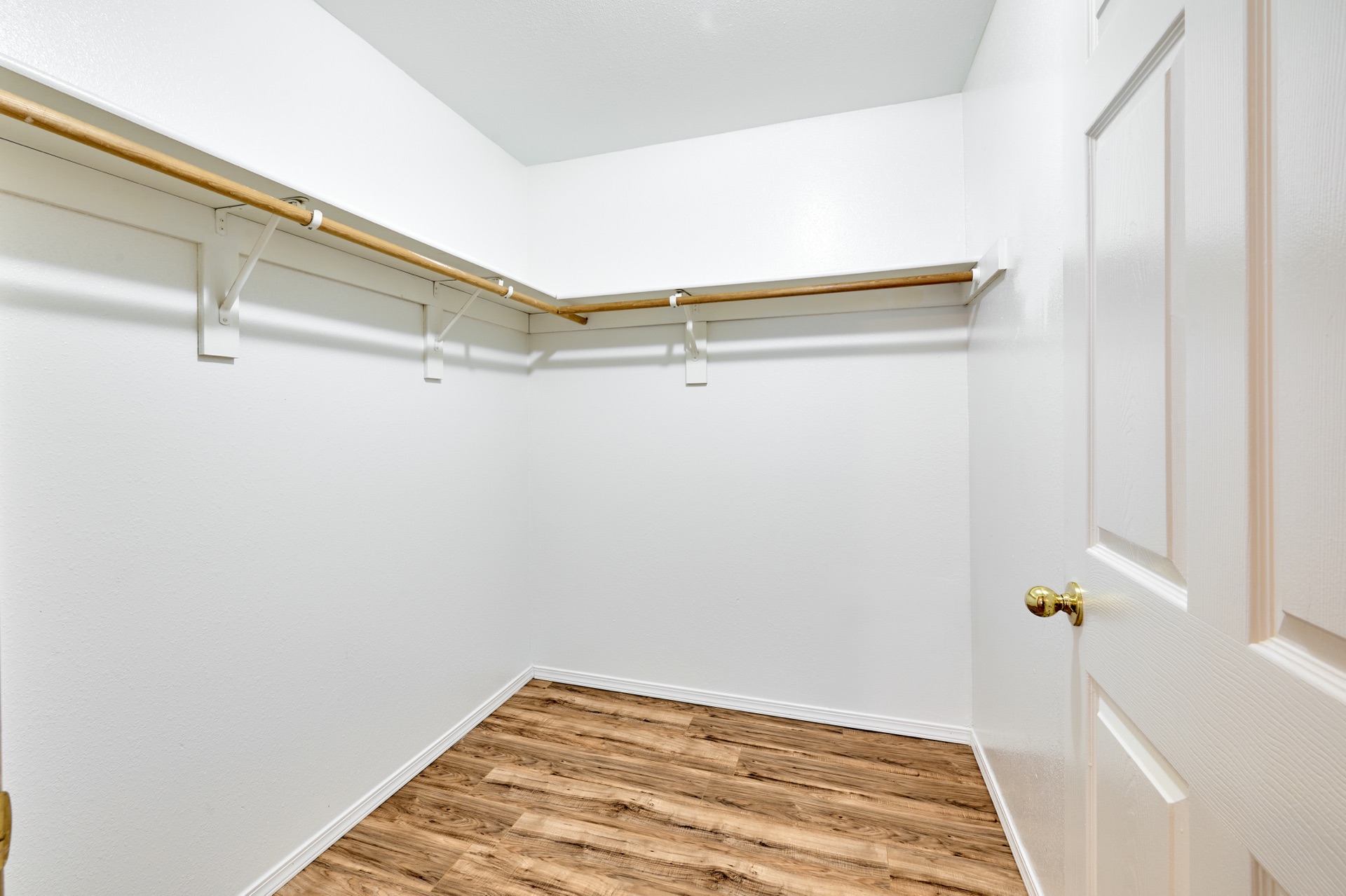 Walk-in closet in primary bedroom